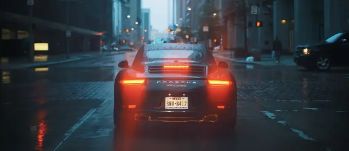 gray Porsche car on road